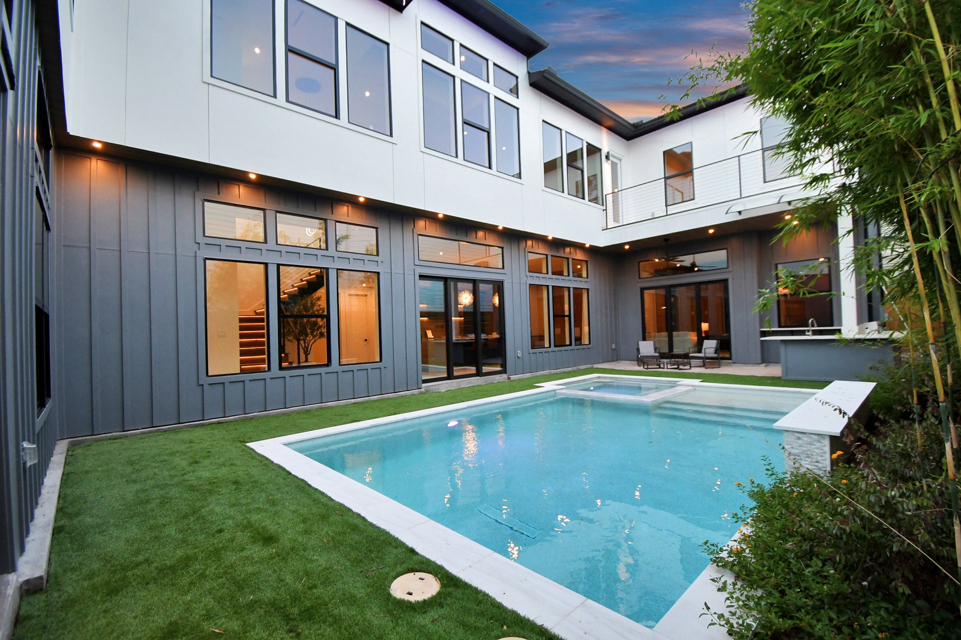 John Dreaper Villa private courtyard pool at twilight