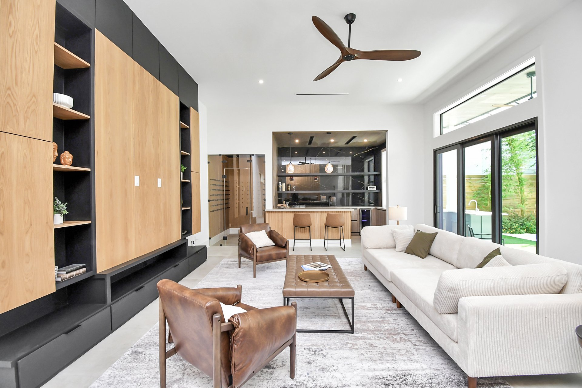 Living room with full bar and wine cellar